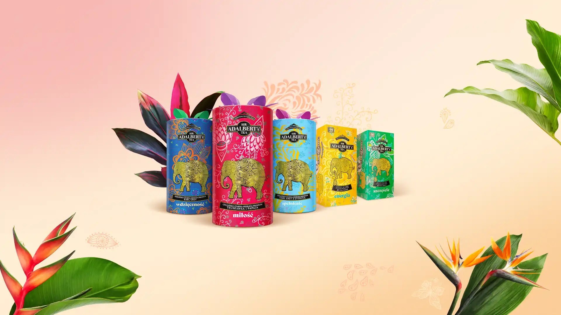Kolorowe opakowania herbat Sir Adalbert's z motywem złotego słonia na pastelowym tle z tropikalnymi liśćmi