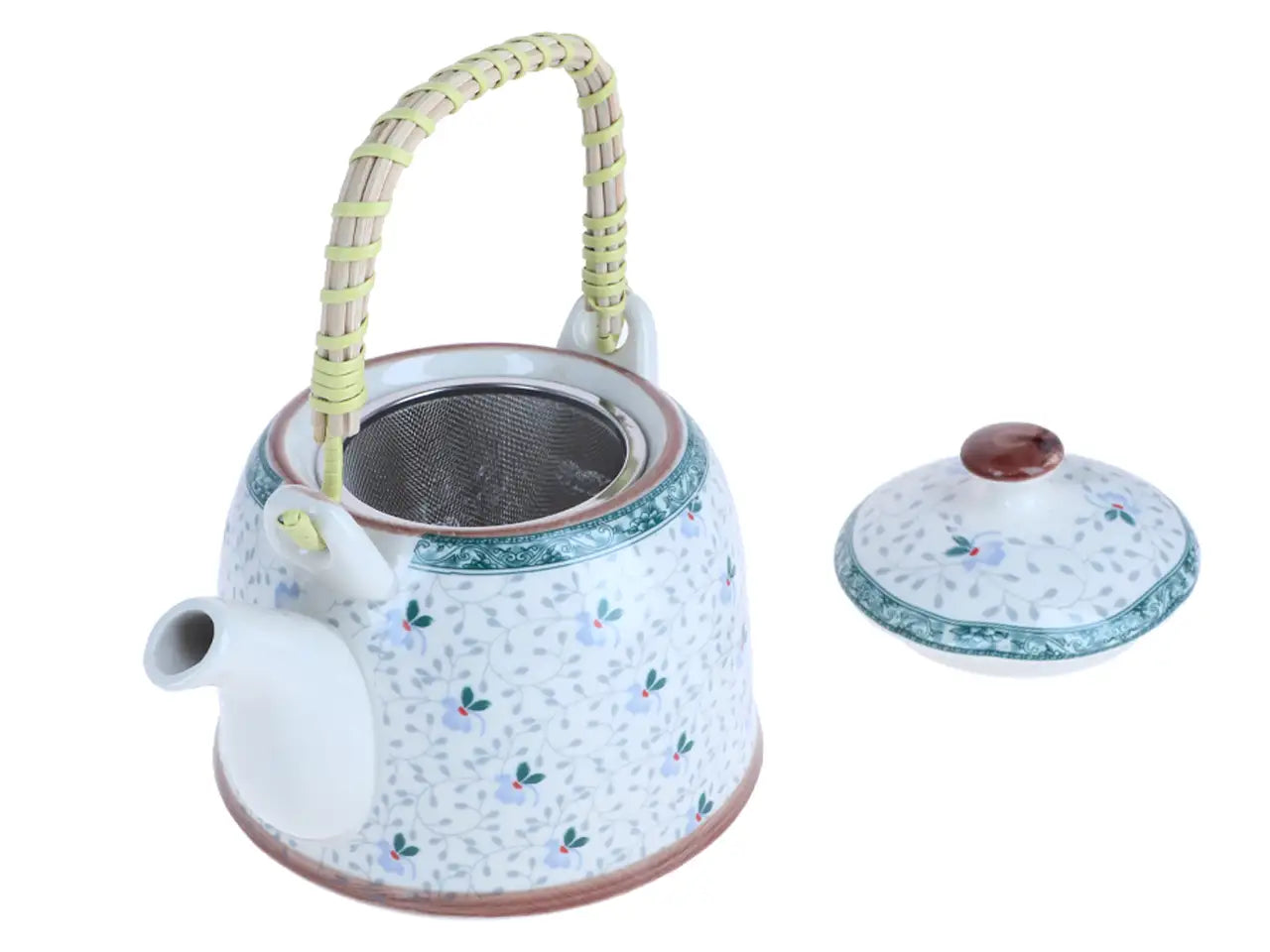 Biała ceramiczna czajnik z naczyniem na herbatę i wzorem kwiatowym, uchwyt pleciony