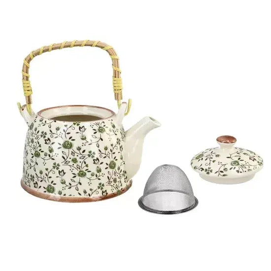 ceramiczny czajnik z zaparzaczem, ozdobiony zielonym wzorem kwiatowym, bambusowa rączka