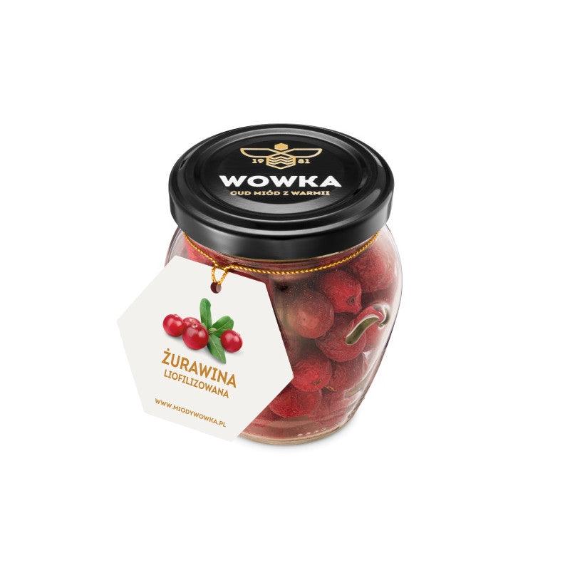 Słoik liofilizowanej żurawiny Wowka z czarną nakrętką i etykietą na sznurku